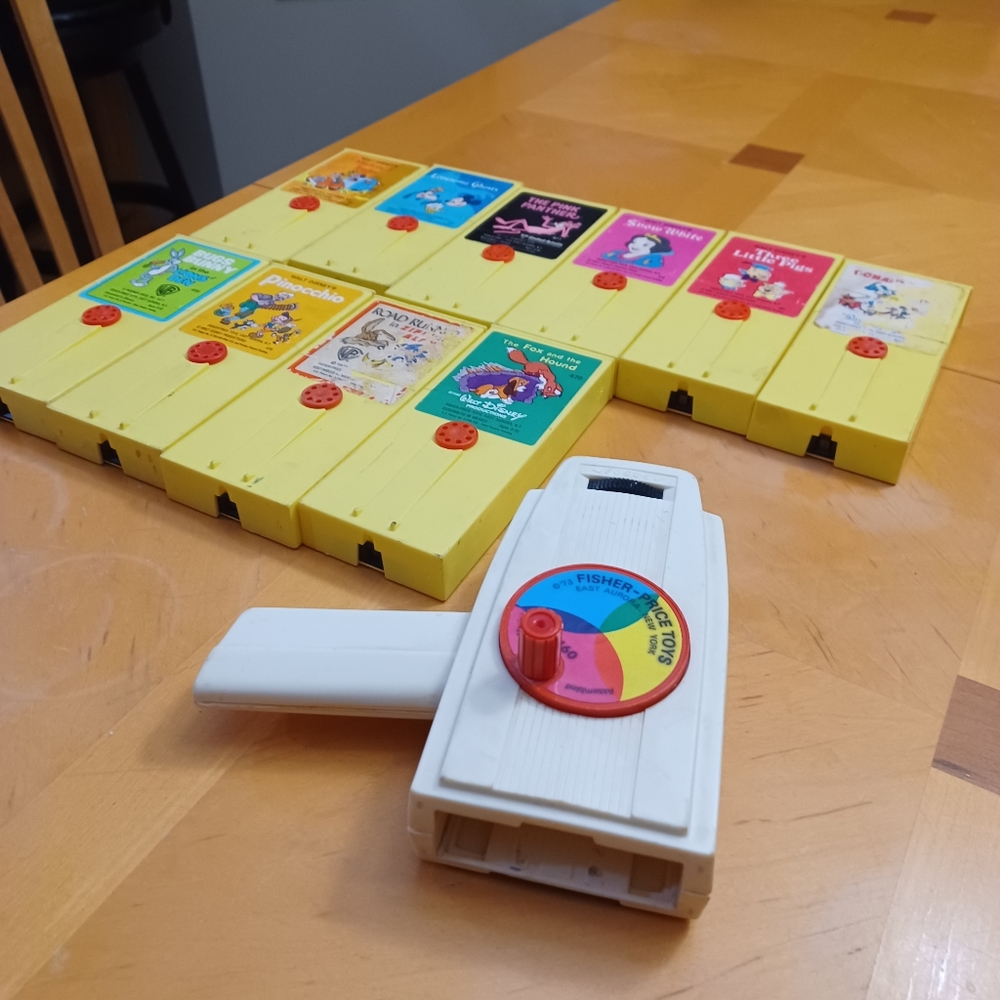Vintage Fisher Price Movie Viewer plus 10 movies